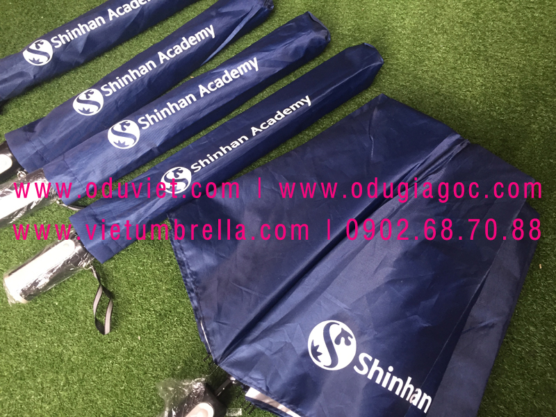 xưởng sản xuất ô dù cầm tay in logo quảng cáo